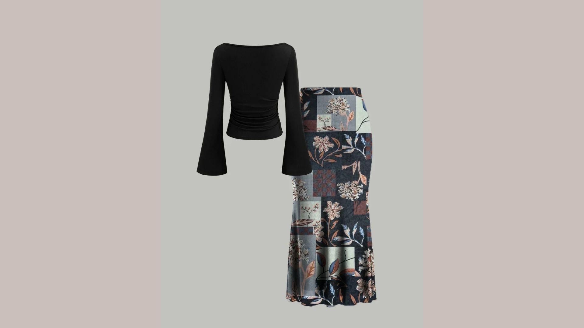 A black dress with a floral print paired with a long sleeve top, showcasing a stylish and coordinated outfit.