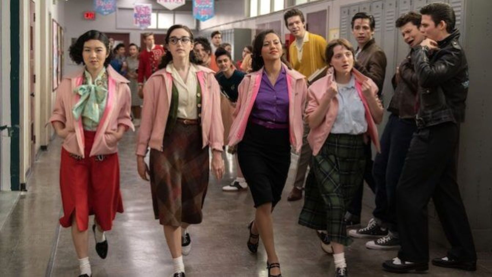 The Pink Ladies look is one of the most iconic group styles from Grease 50s fashion history.