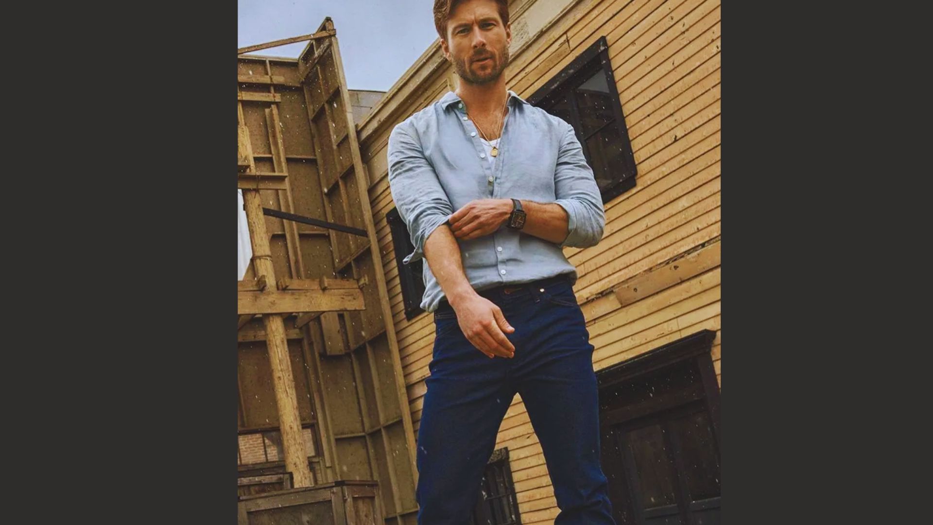 Glen Powell in a blue shirt, looking stunning.