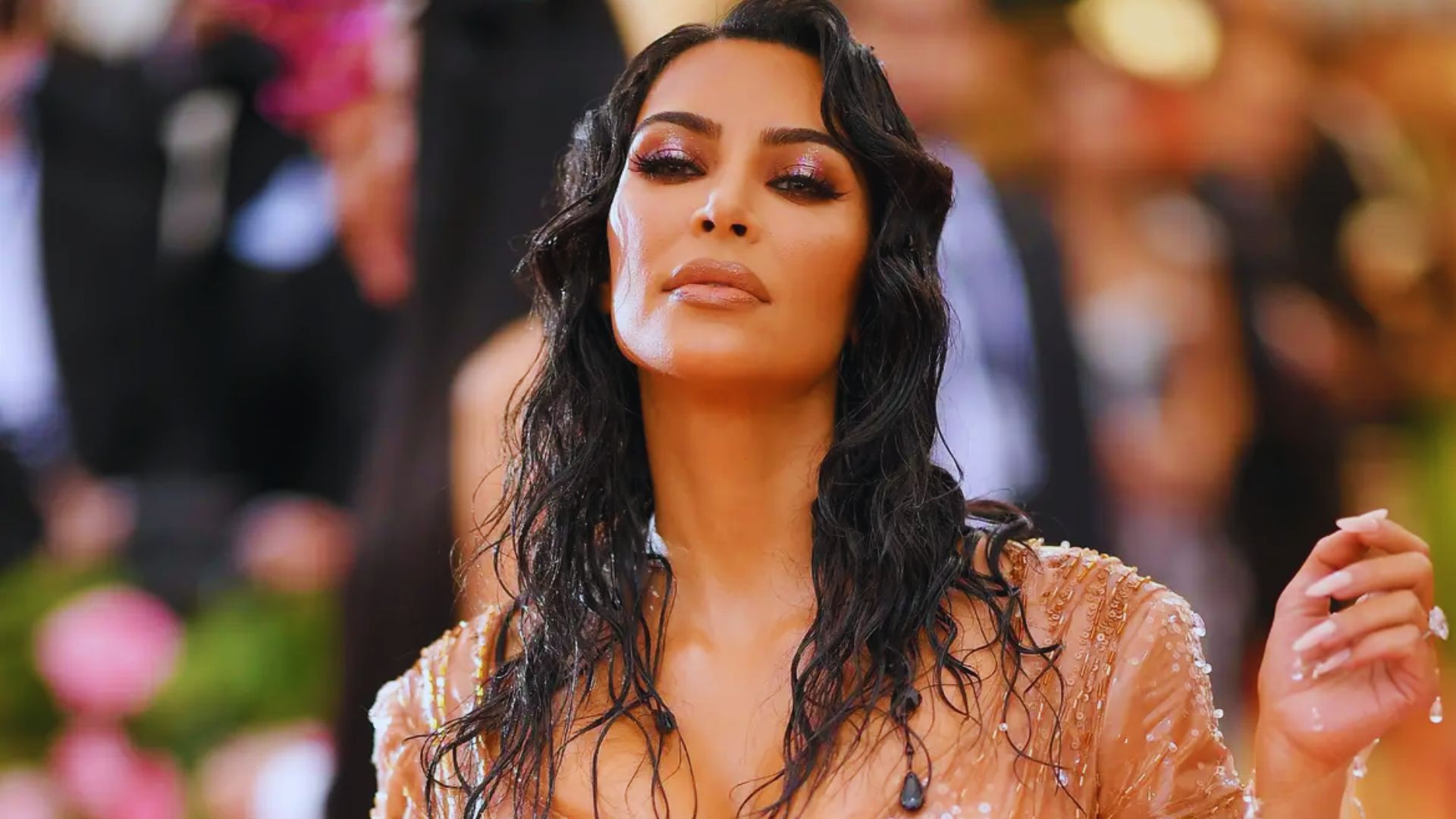 . Kim Kardashian's makeup artist shares tips for achieving her signature flawless skin in a beauty tutorial.