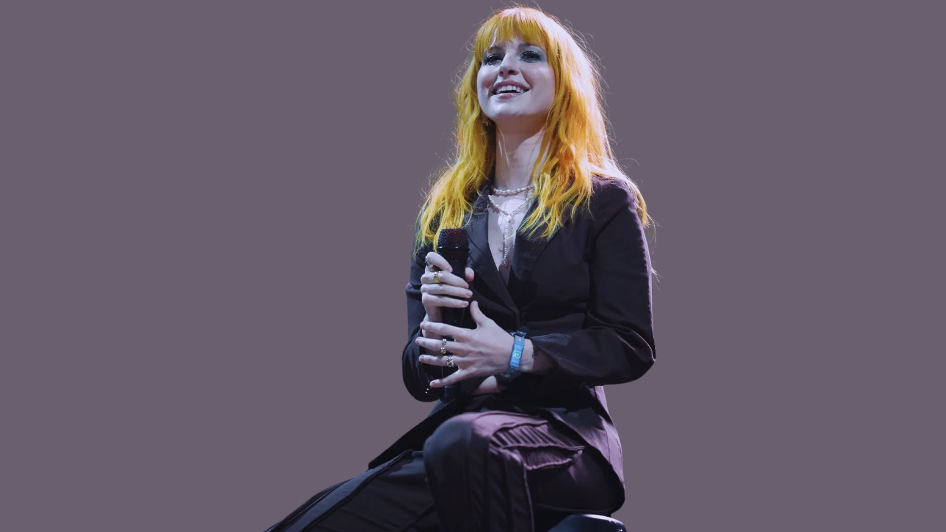 Album cover of "The Hunter" by Florence and the Machine, featuring a dramatic, artistic design with bold colors.