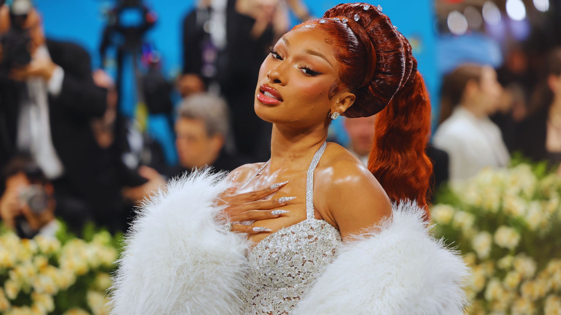 Nicki Minaj wears a pink 'Barbie' dress, reflecting her childhood memories and playful style.