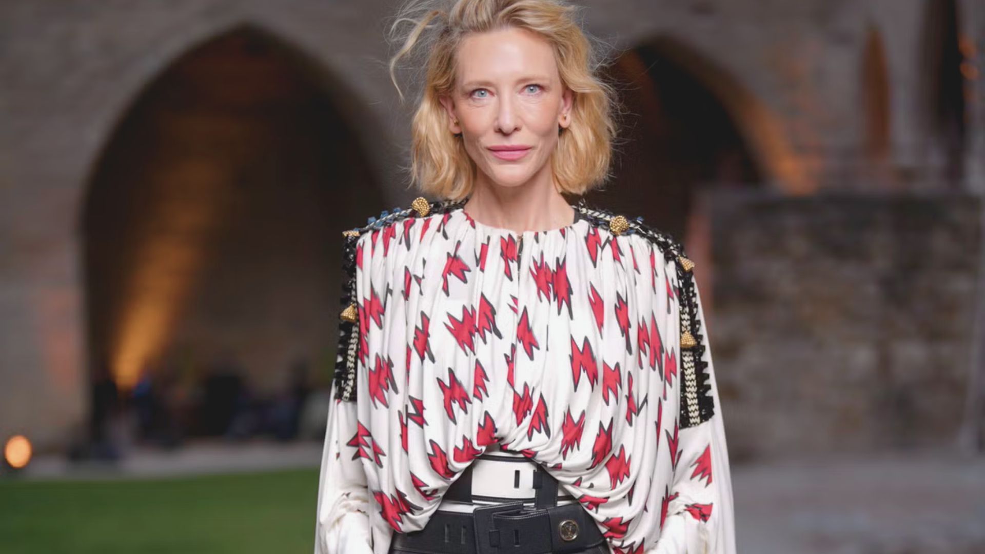 Cate Blanchett showcases a stunning Chanel outfit, marking a significant fashion moment at the show.