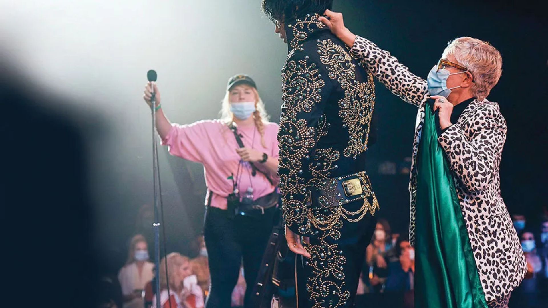 Julie Presley performs with her father, Elvis, at the grand opening of the Elvis Presley Museum in Memphis.