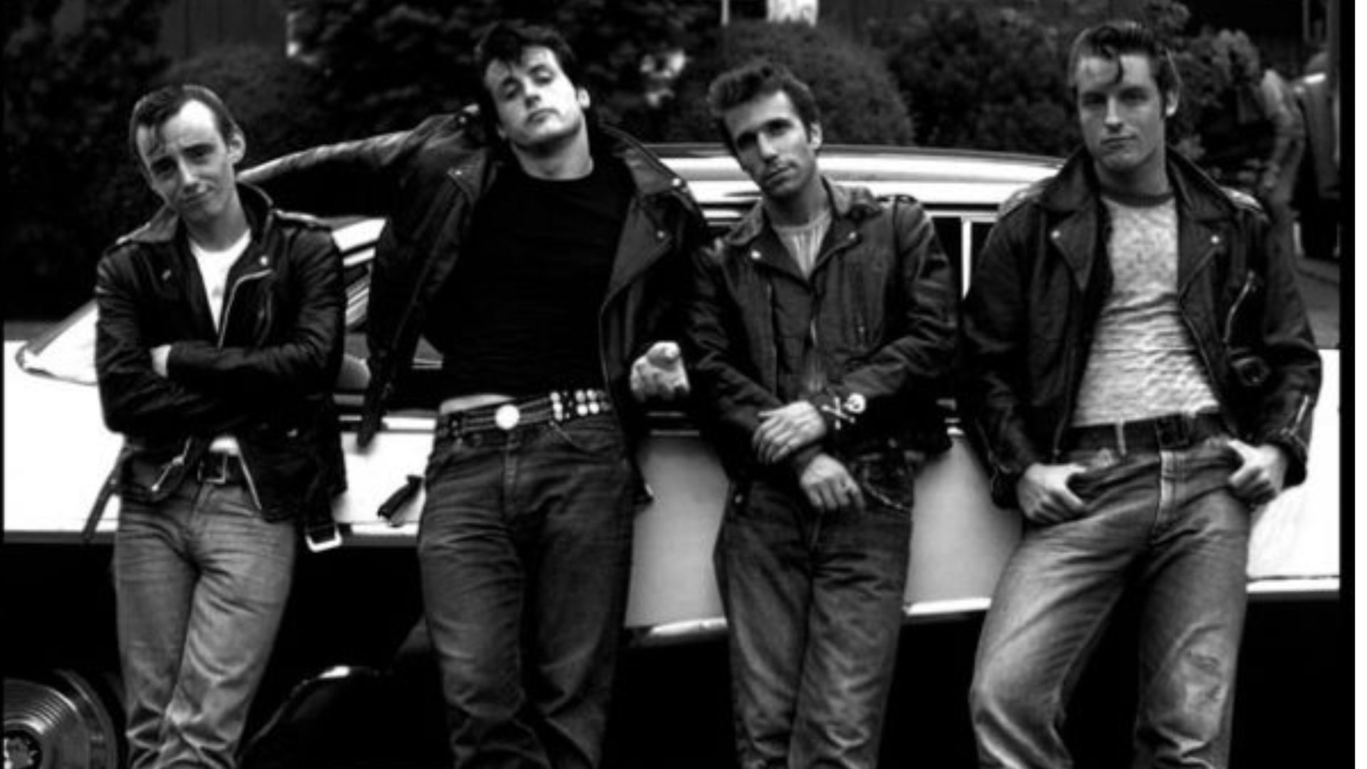 Men's Grease 50s fashion is bold and cool, built around leather, denim, and slicked back hair.