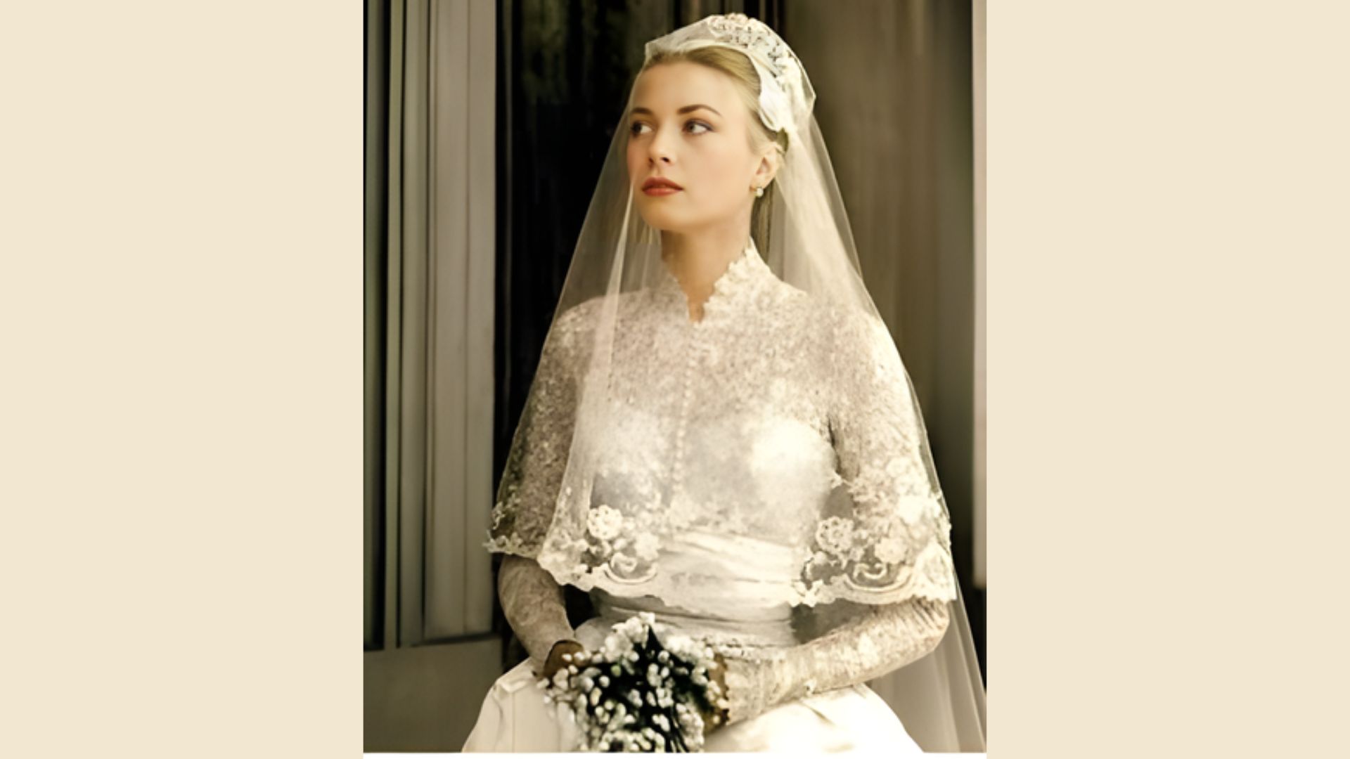 3. A woman in a stunning wedding dress and veil stands proudly, surrounded by flowers, capturing a moment of celebration.