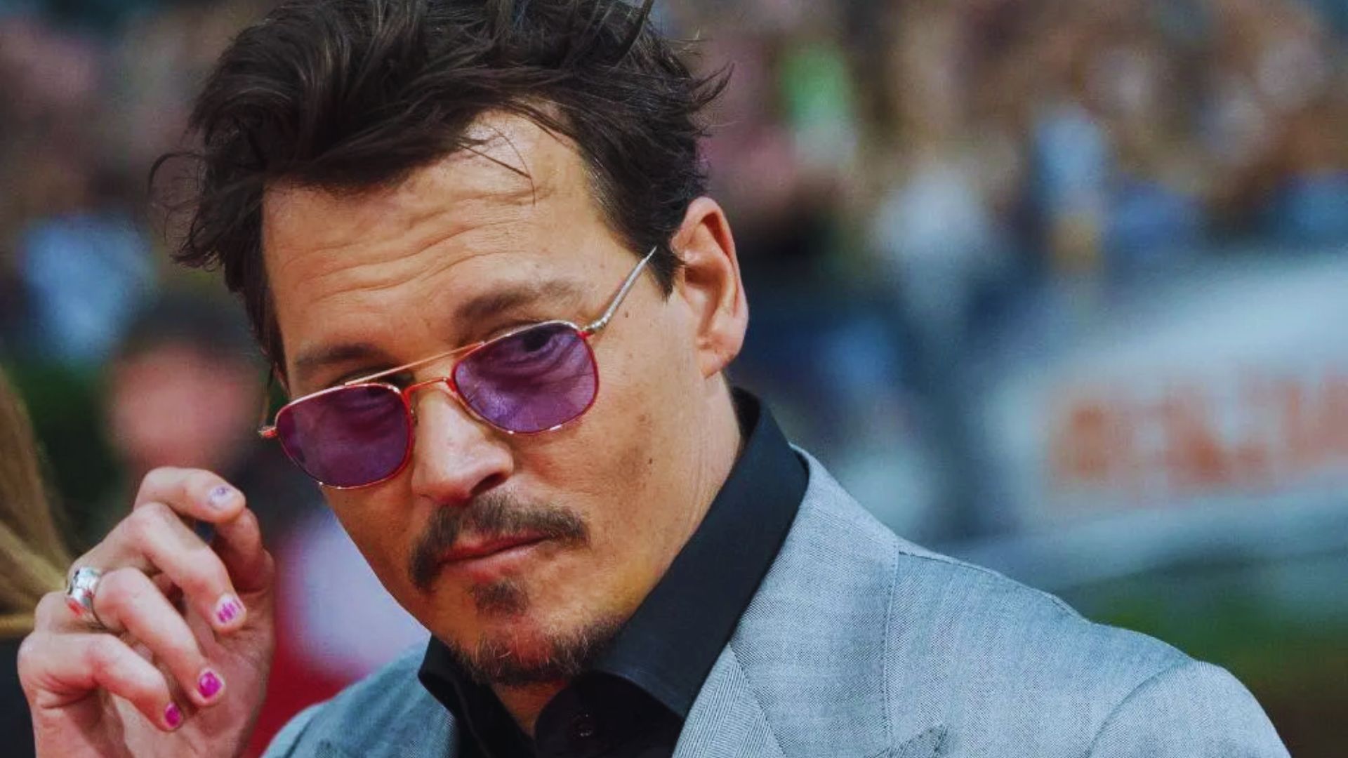 1. Canadian actress and model, Johnny Depp's ex-wife, is suing him for $50 million.