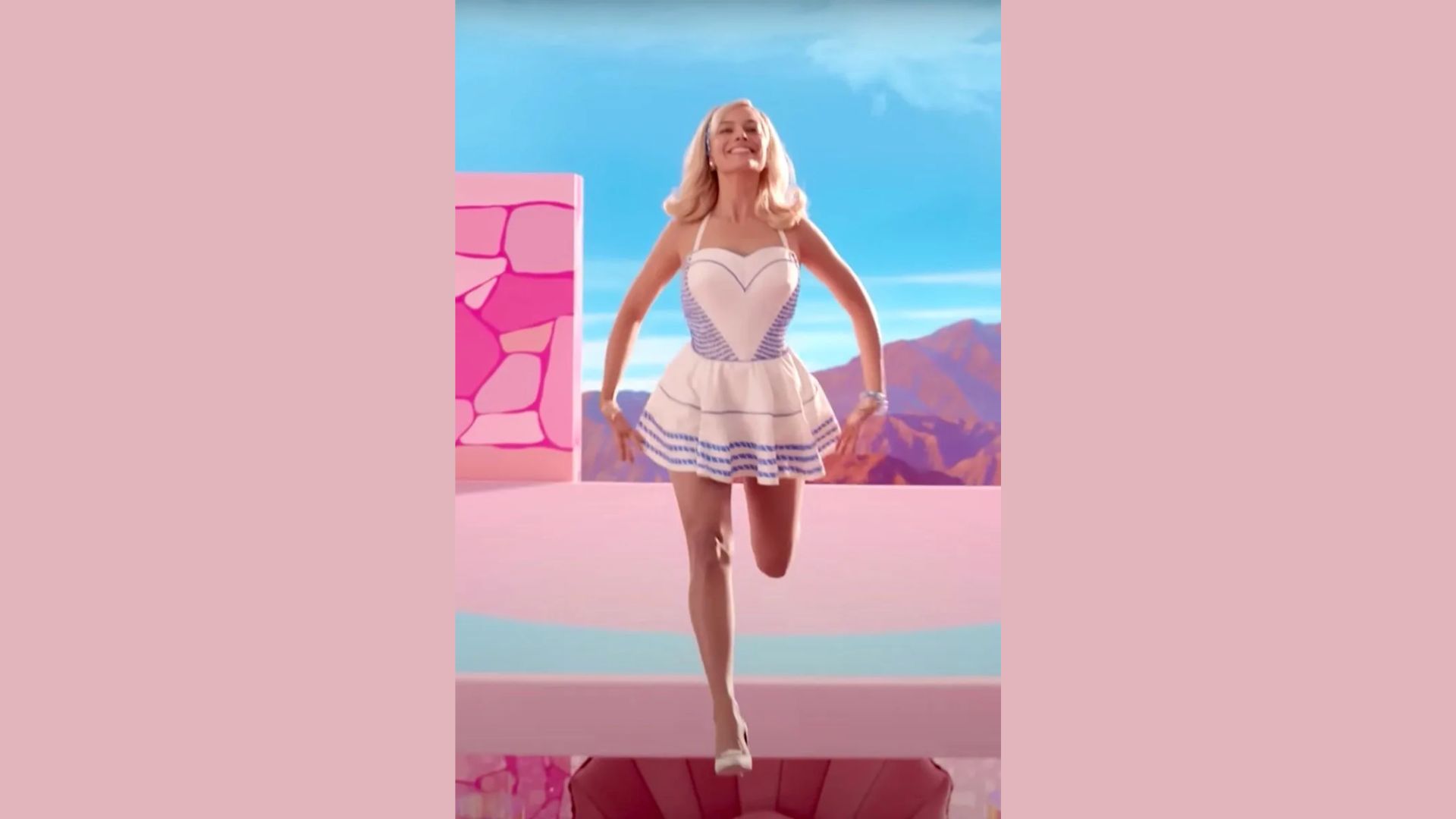 "A Barbie doll wearing a white dress and blue shoes stands upright with a cheerful expression and long flowing hair."