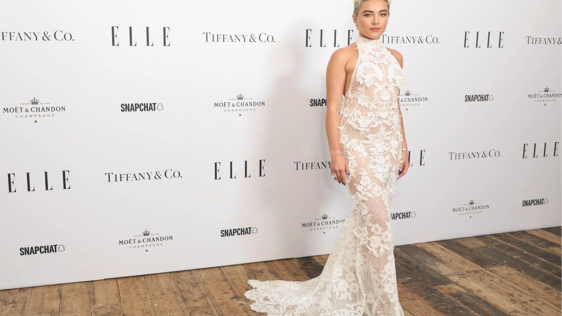 Florence Pugh shines in sheer white lace gown at ELLE event showing bold glam.