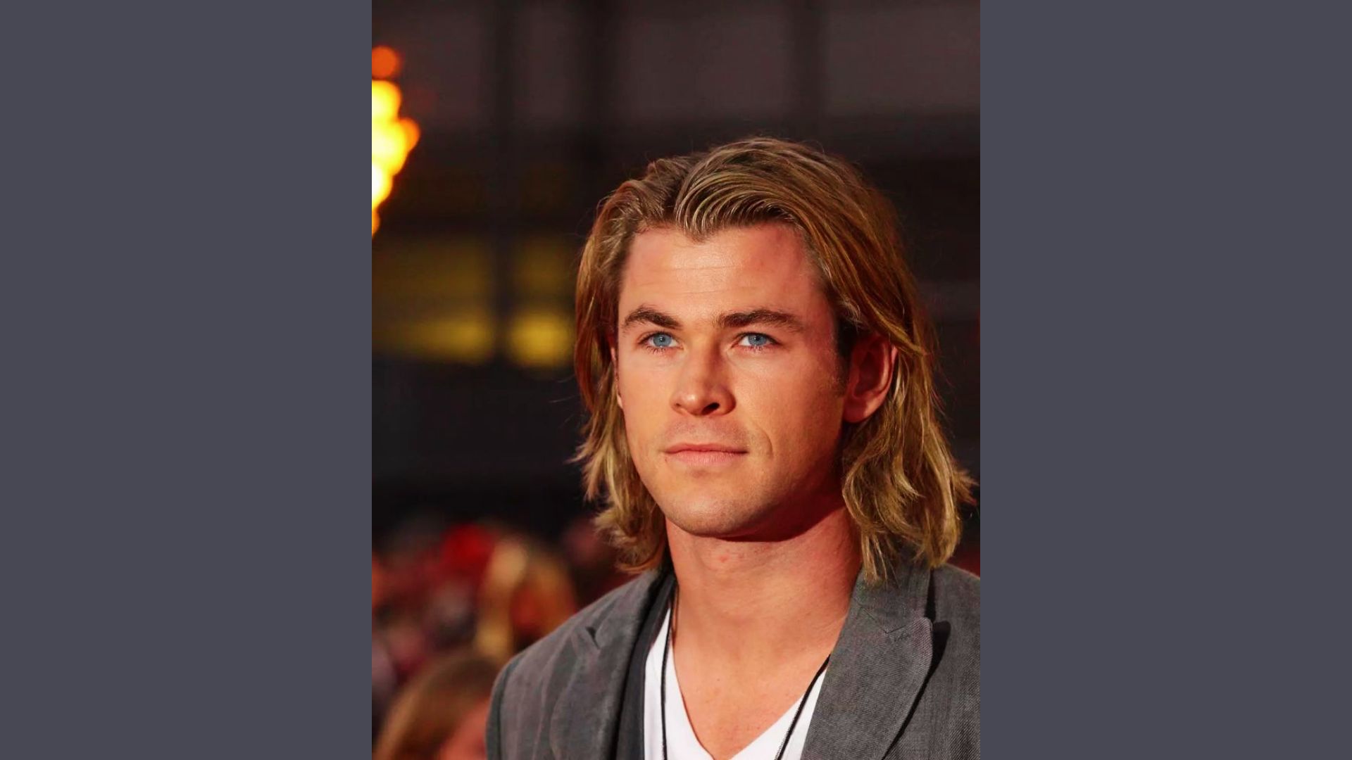 Chris Hemsworth, a handsome man, sports a trendy wavy shag cut hairstyle, offering inspiration for modern looks