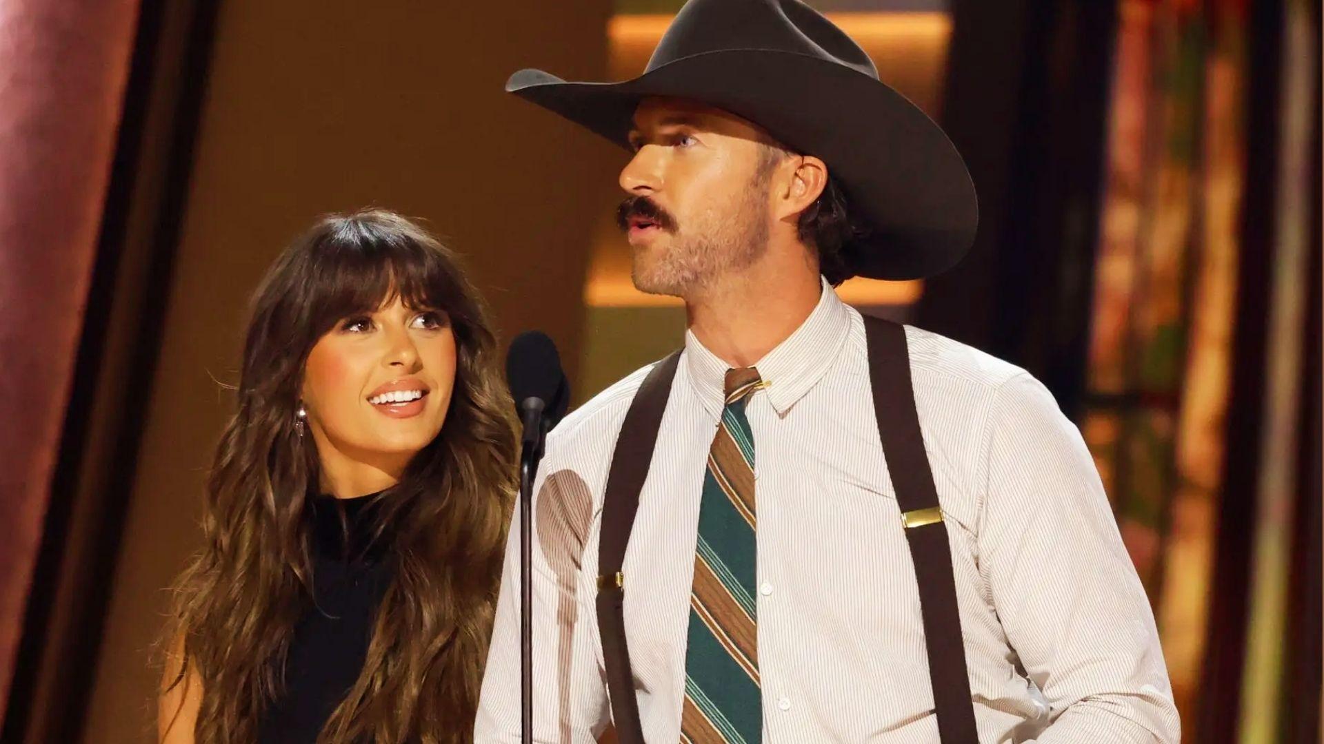 Riley Green and Ella Langley sharing a viral moment at the CMA Awards that sparked relationship rumors.