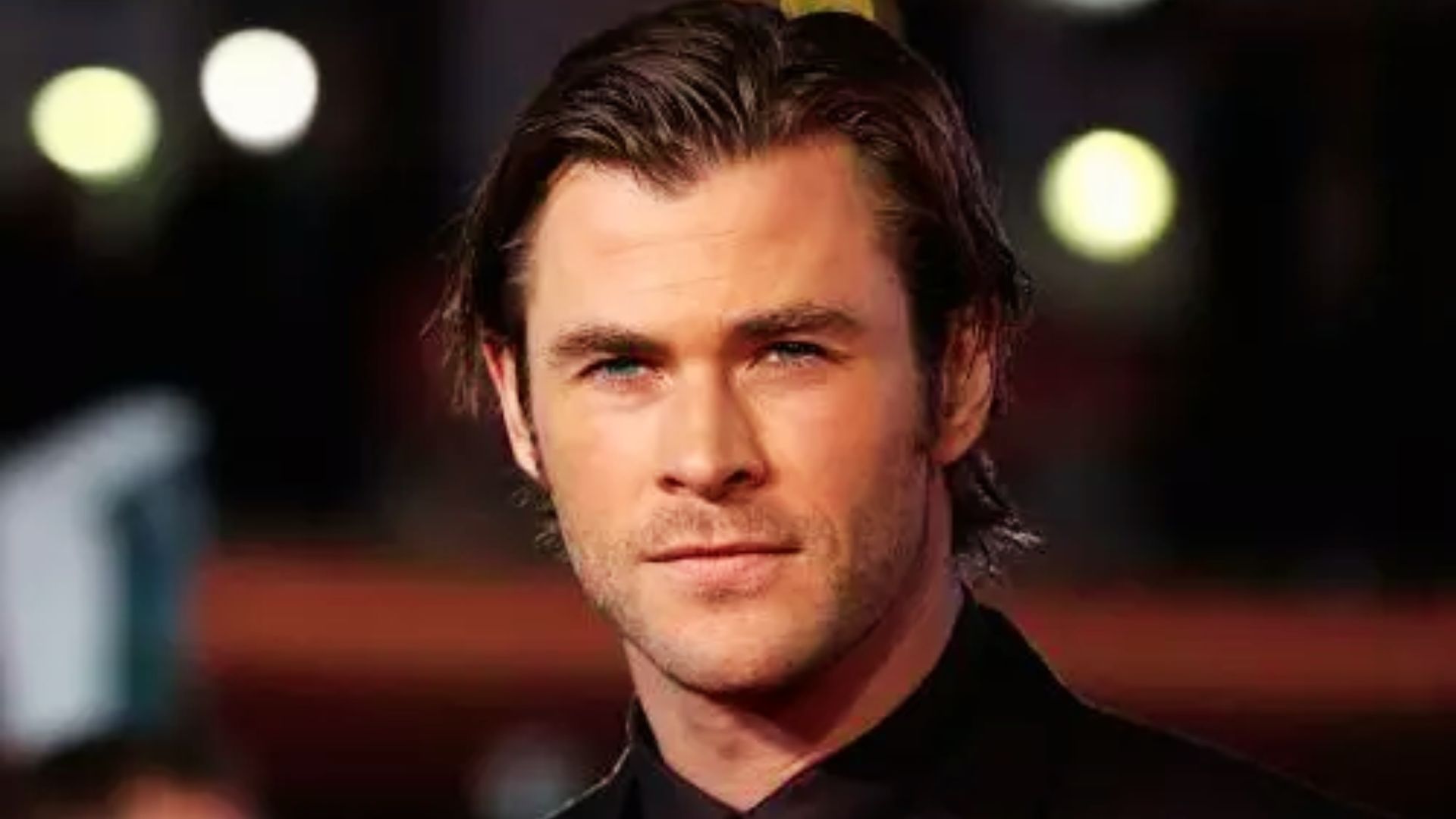 A man featuring a hairstyle that reflects Chris Hemsworth's popular looks