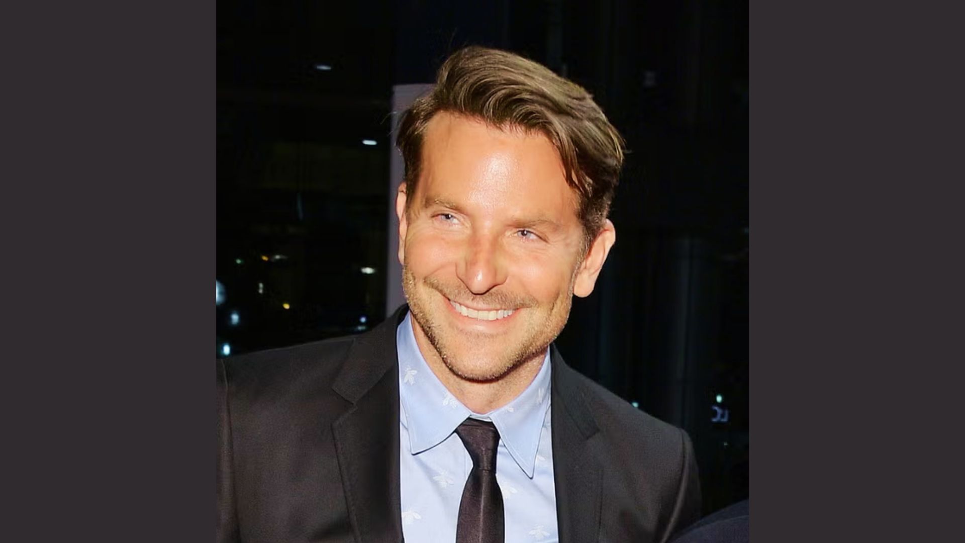 Bradley Cooper showcasing a stylish haircut with Side- Parted Medium Hair.