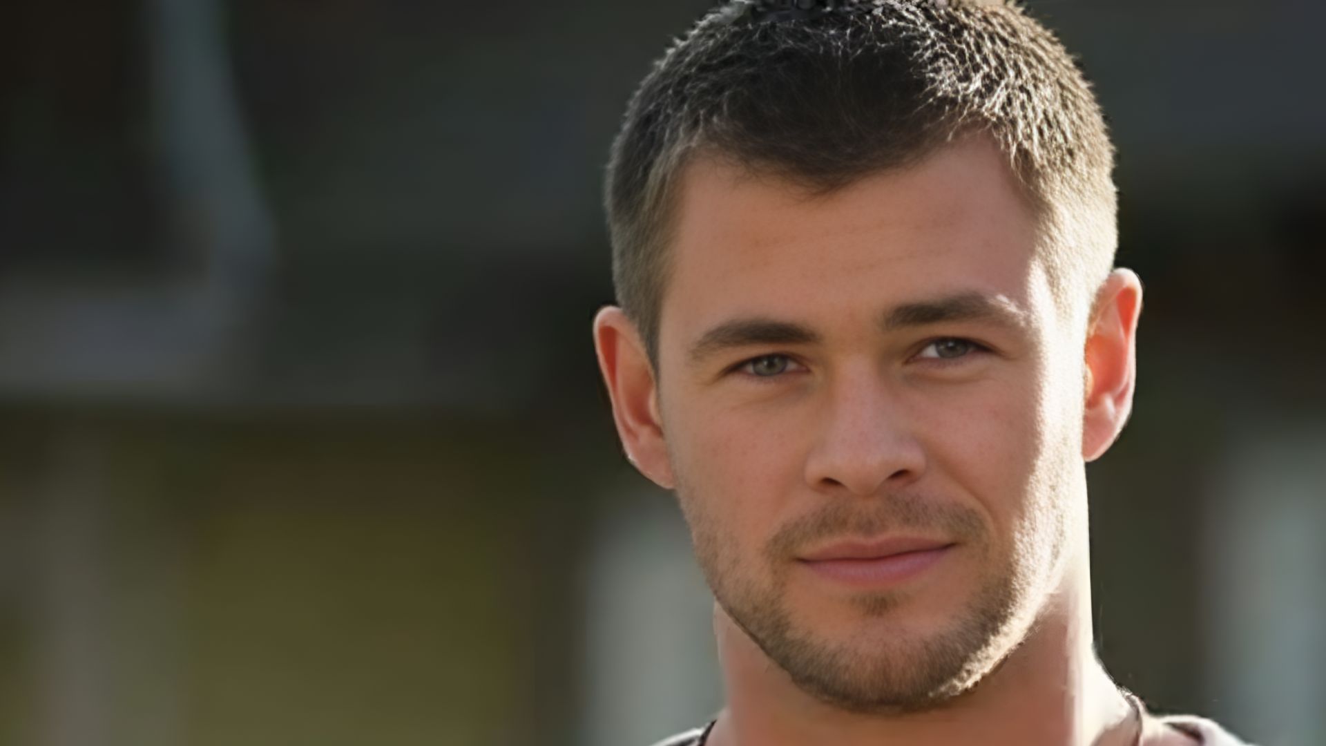 Chris Hemsworth, showcasing a buzz cut hairstyle, offering inspiration for modern looks.