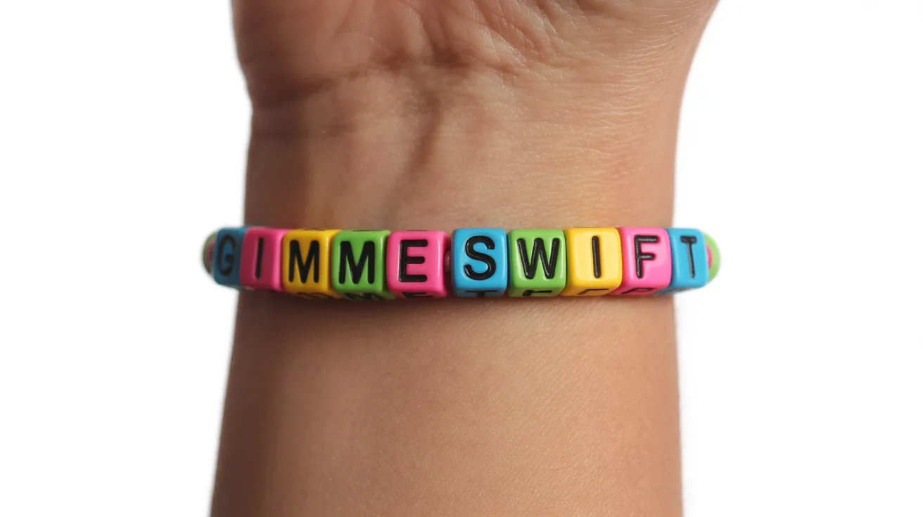 bold colorful bracelet on wrist with cube beads spelling GIMME SWIFT in uppercase.
