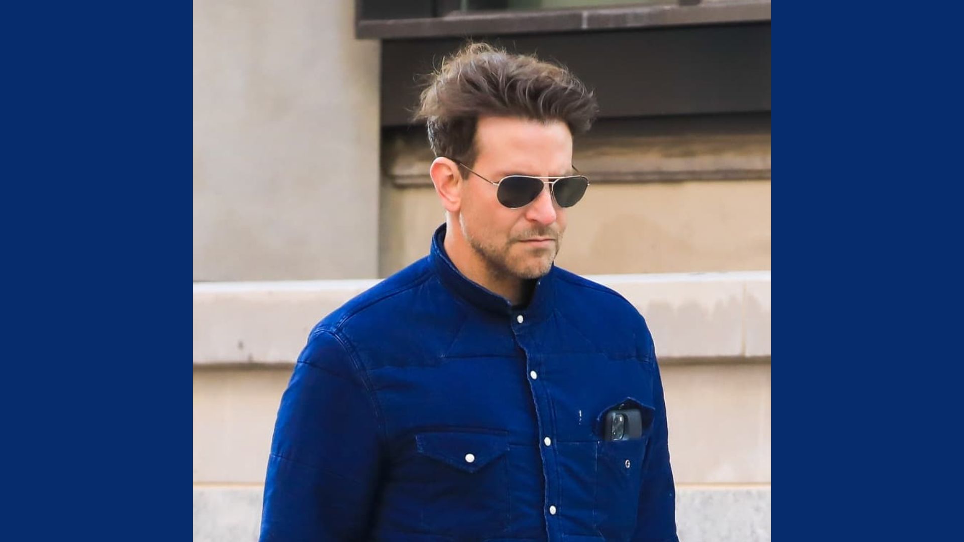 Bradley Cooper showcasing a stylish haircut with Clean short sides and volume on top.