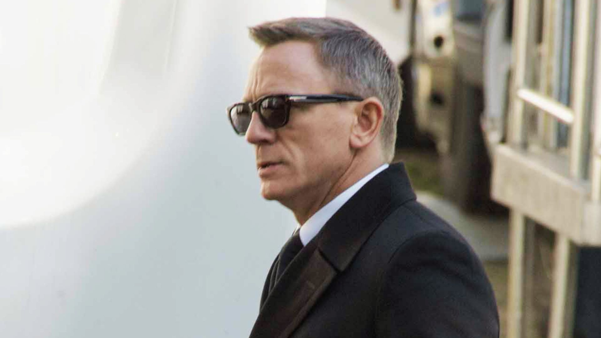 Daniel Craig as James Bond, showcasing his iconic hairstyle that became widely popular among fans.