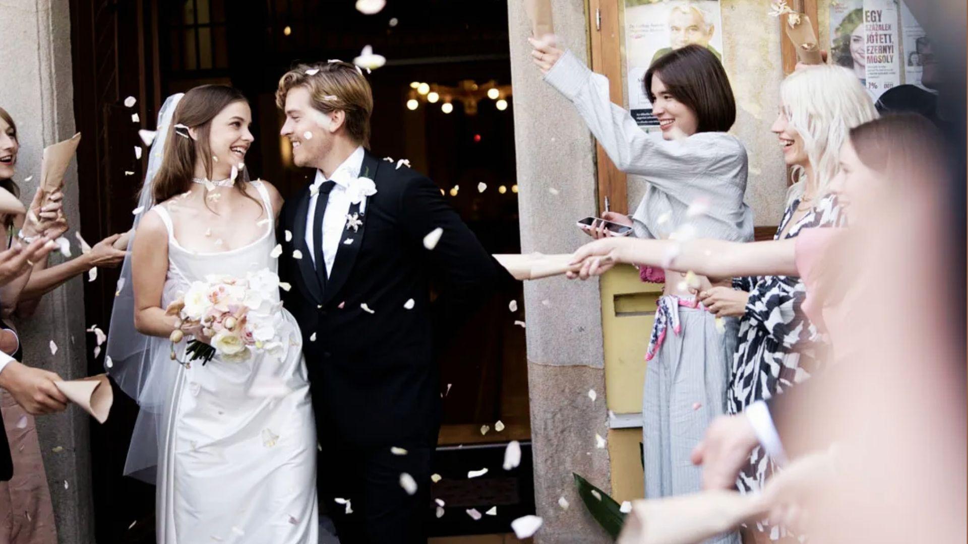 Bride in a luxury wedding look with accessories and classic bridal styling.