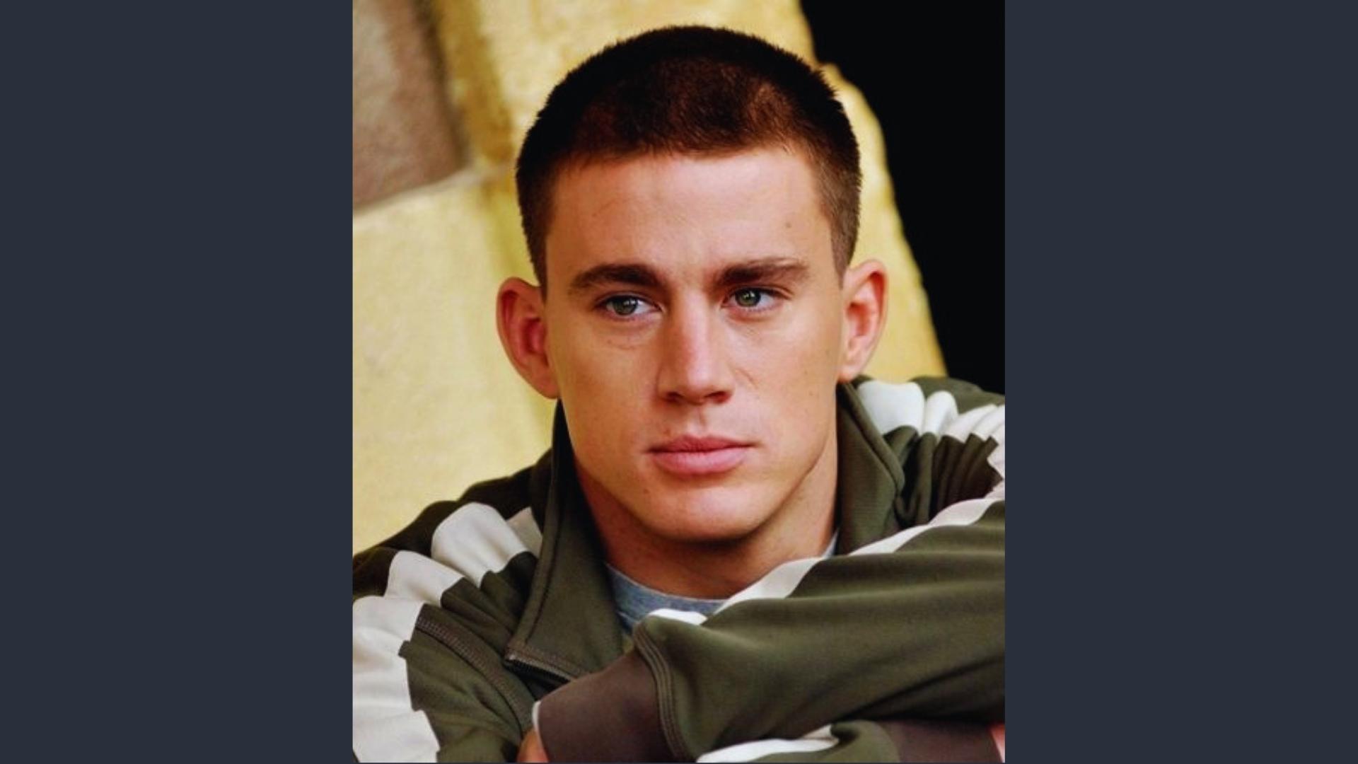 Young Channing Tatum wears a textured butch cut buzz style with fuller top, paired with a sporty track jacket.