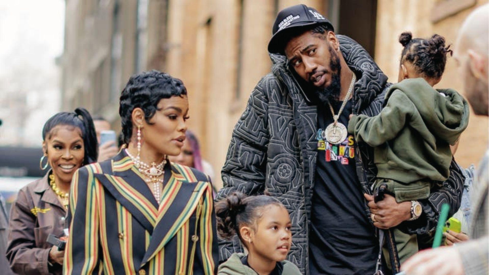 Teyana Taylor and Iman Shumpert with their kids roaming on the streets.