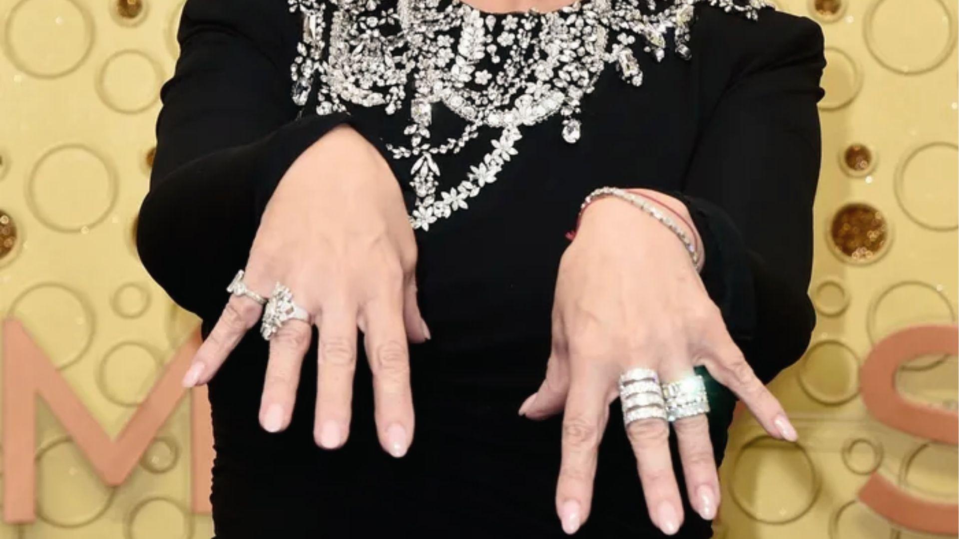 Sharon Osbourne shows off diamond rings and crystal-embellished black gown at event