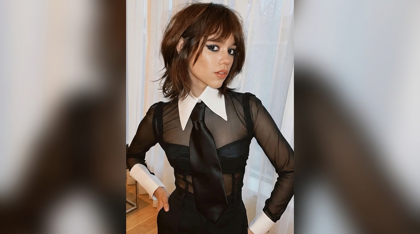 Jenna Ortega showing off a trendy wolf cut with textured layers and volume.
