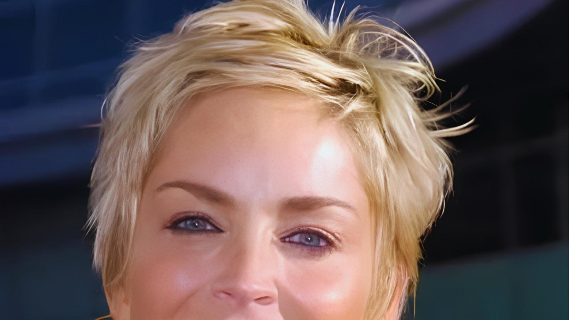 Platinum blonde bowl-cut pixie with sleek side part and sharp silhouette, channeling Twiggy’s iconic 1960s androgynous look.