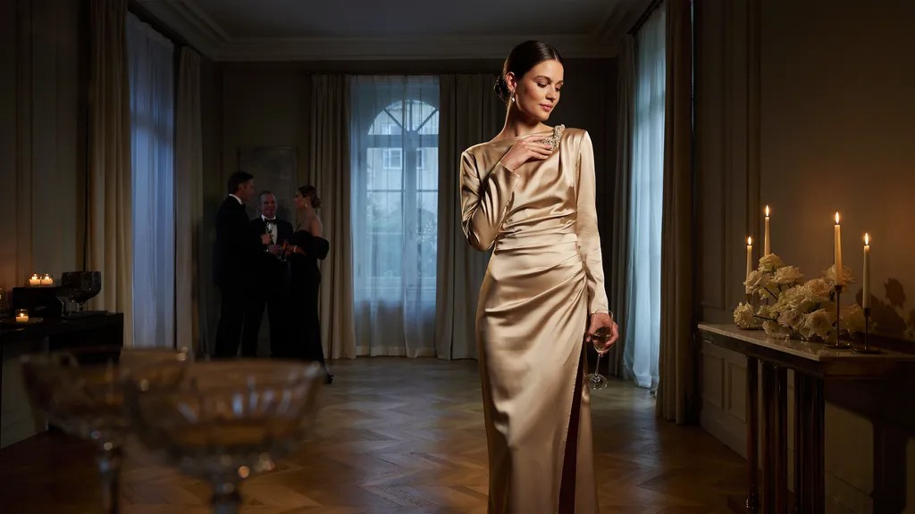 Woman wearing a structured maxi dress for a semi formal event.
