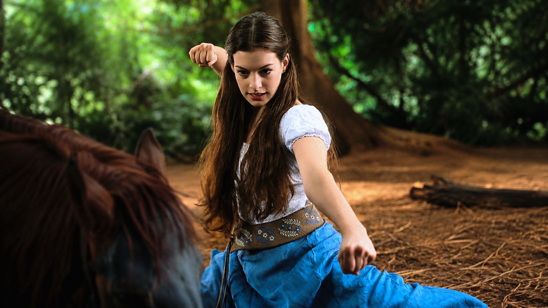Anne Hathaway's long layered curls in 2004, Ella Enchanted movie