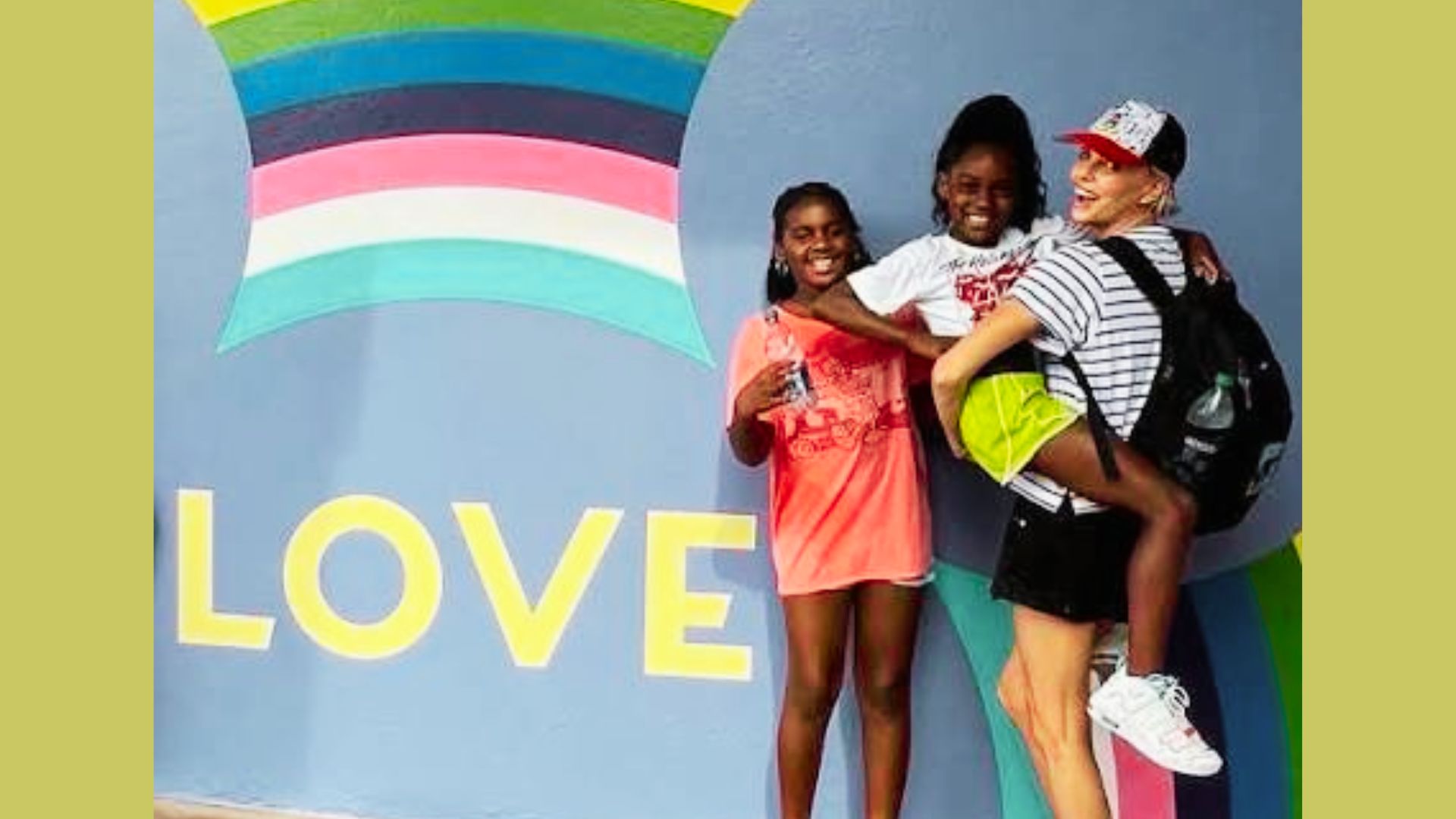 image of Charlize Theron with her girls.