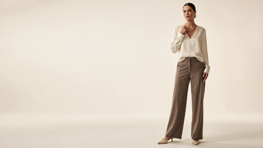 Woman wearing a flattering neckline for an inverted triangle body shape.