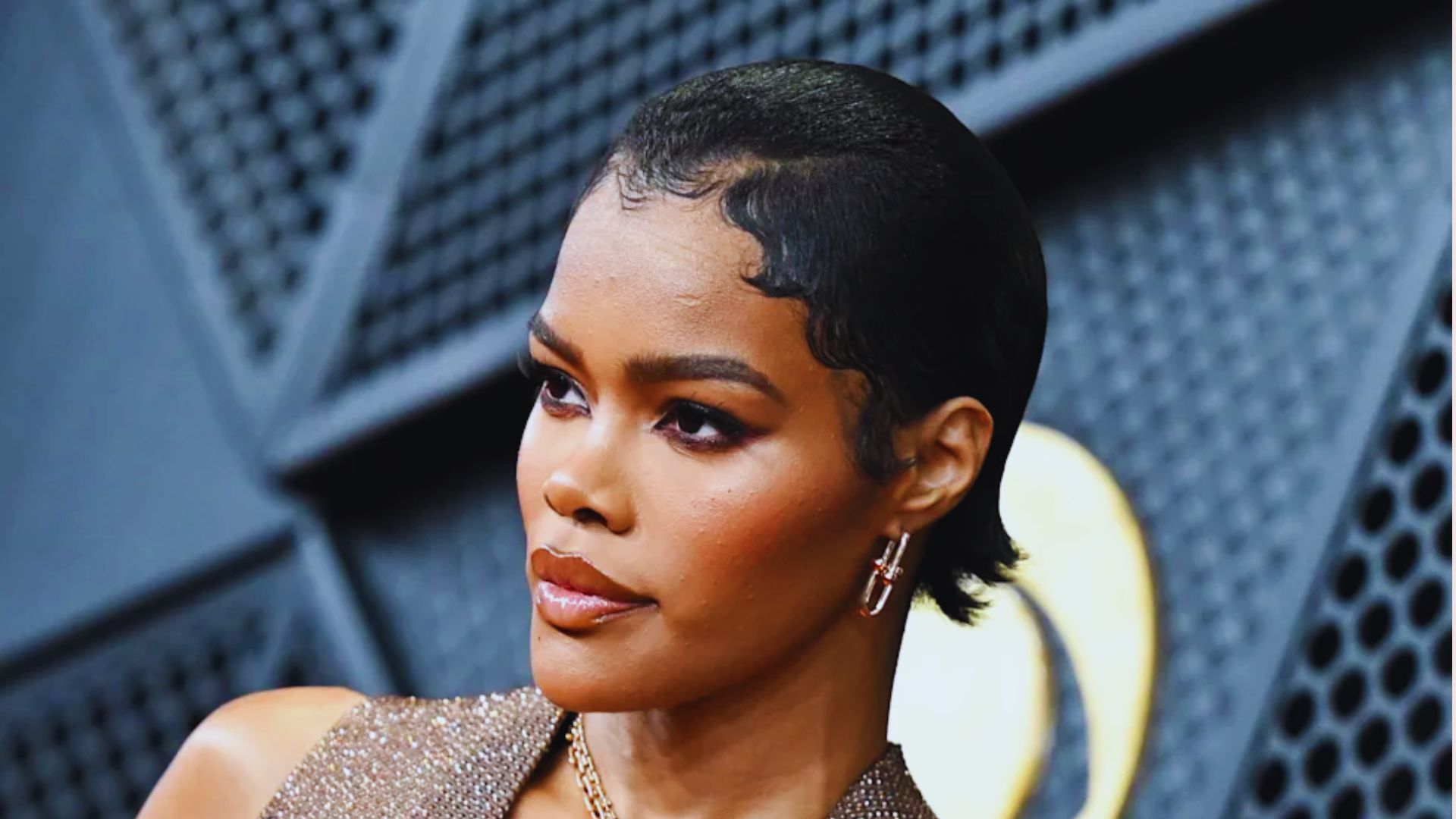 image showing Teyana Taylor’s slicked black hairstyle.