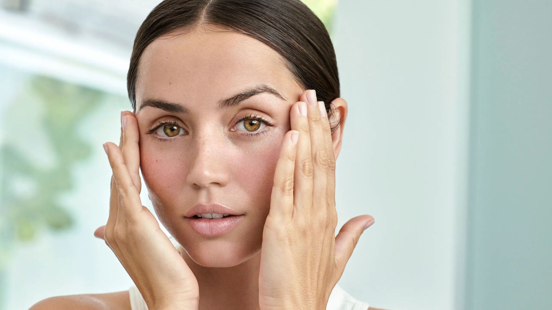 Ana de Armas skincare routine focused on hydration and healthy skin.